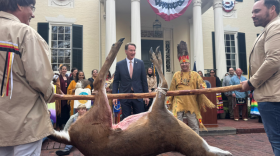 Governor Glenn Youngkin and Mattaponi Chief Mark Falling Star Custalow participate in the 348th Virginia Thanksgiving Tribute ceremony
