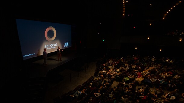 Andrew Sherburne, the executive director of FilmScene, and Programming Director Ben Delgado, kicked off the festival weekend by thanking sponsors and attendees for their support ahead of the Nightbitch screening.