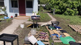 Debris in front of house