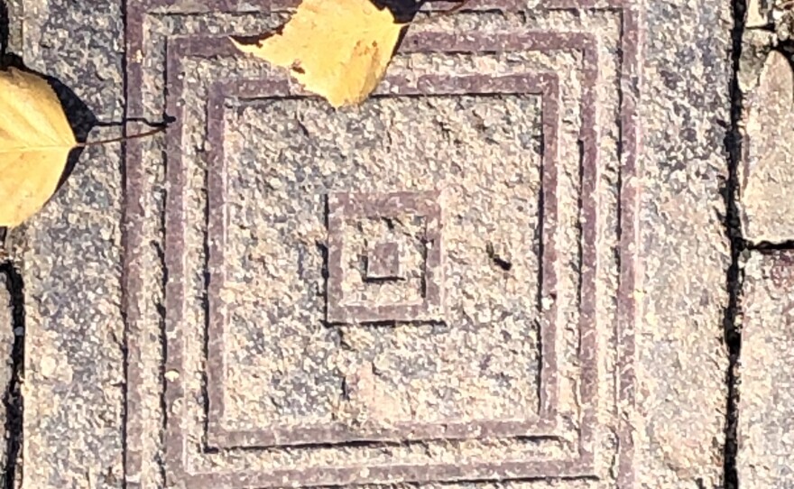 Some parts of the path are paved with tiles.