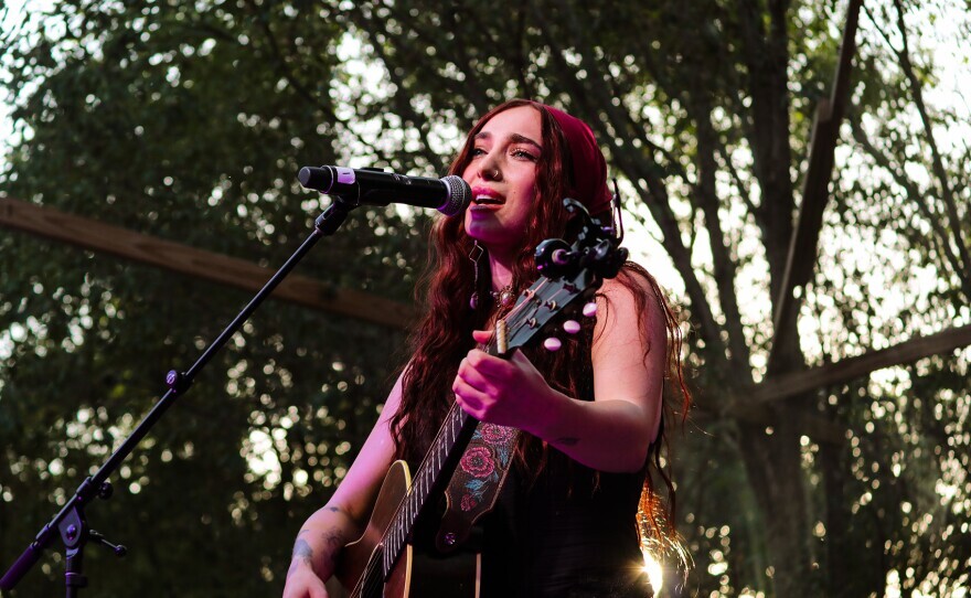Minnesota-born singer-songwriter Anna Graes wowed a big Iowa crowd with new music and songs from her debut album Solstice at Lost Woods Music Festival.