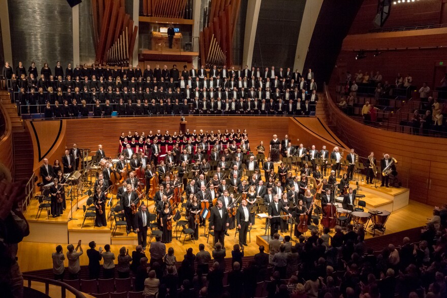 Michael Stern and members of the Kansas City Symphony, symphony chorus and soloists receive an ovation from the audience in Helzberg Hall following May 2017 performance of Benjamin Britten's "War Requiem."