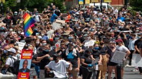 Demonstrators prepare to march during a Black Lives Matter rally and march calling for racial justice following the murders of George Floyd and Breonna Taylor, Saturday, June 28, 2020, in Cincinnati.
