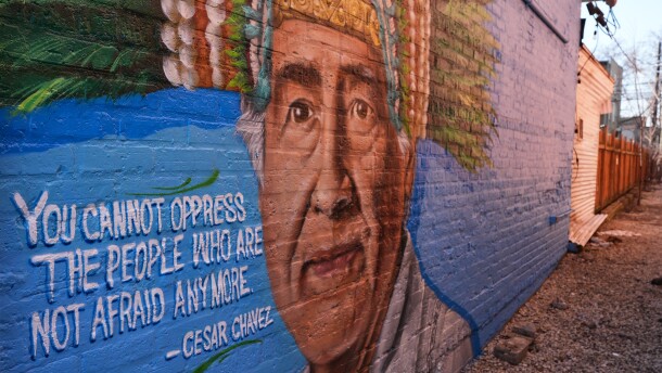 FILE - A Cesar Chavez mural blankets the exterior of a building in Chicago, March 19, 2026.