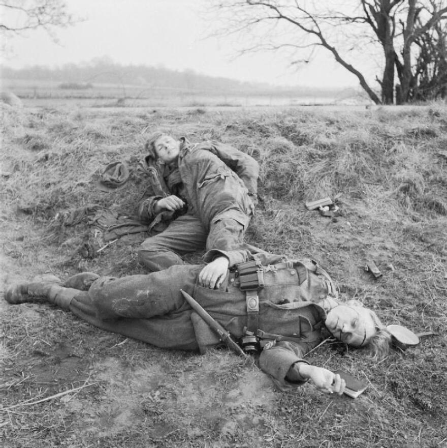 Crossing the Rhine 24 -31 March 1945 : Two young German soldiers, one injured, the other dead. As they advanced into Germany, the Allied soldiers were constantly surprised at the extreme youth of the enemy forces.