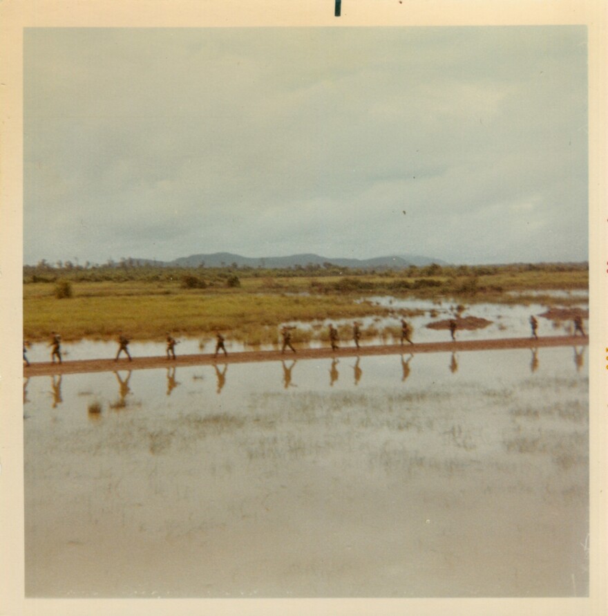 The 1st Battalion, 5th Infantry Regiment walks near Dau Tieng in the summer of 1968. The unit was ambushed on Aug. 21 of that year.