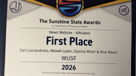 A photo of a first place certificate from the Society of Professional Journalists Sunshine State Awards. 