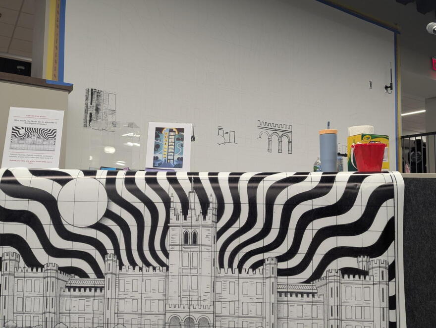 The large mural will take shape over the course of the Homecoming Week inside the Holmes Student Center.