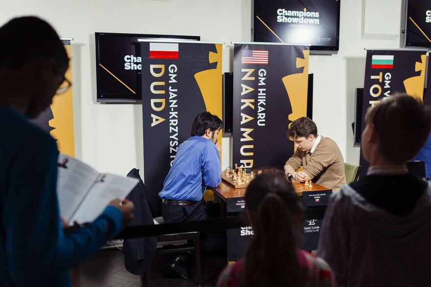 Fans crowd to watch champions Hikaru Nakamura and Jan-Krzysztof Duda play rounds of rapid and blitz matches at the St. Louis Chess Club during the Champions Showdown last week.