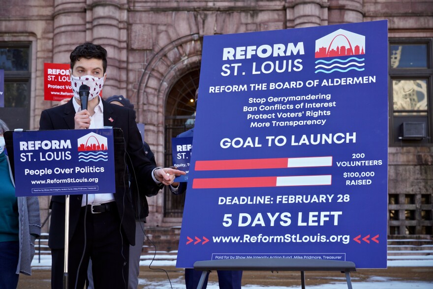 Benjamin Singer explains his organization Show Me Integrity's policy proposal to reform the St. Louis Board of Aldermen in front of City Hall on Tuesday. But he still needs $45,000 and dozens more volunteers to launch the campaign. 