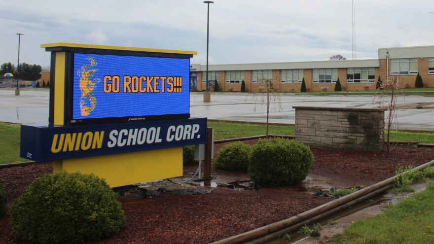 The outside of Union School Corporation and its digital sign, saying Go Rockets! for the corporation's mascot.