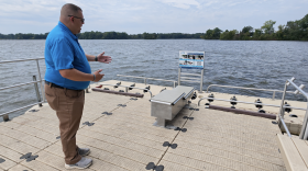 Man shows off an accessible boat launch.