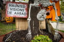 Torres combines humor with the ghoulish to decorate his yard for Halloween.