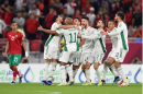 The Algerian National Team celebrates during the 2021 FIFA Arab Cup. Algeria won that tournament, which was a test of Qatar's hosting in advance of the 2022 World Cup.