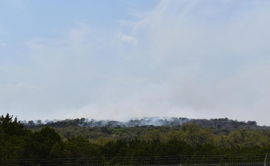 Smoke from a fire at Camp Bullis.
