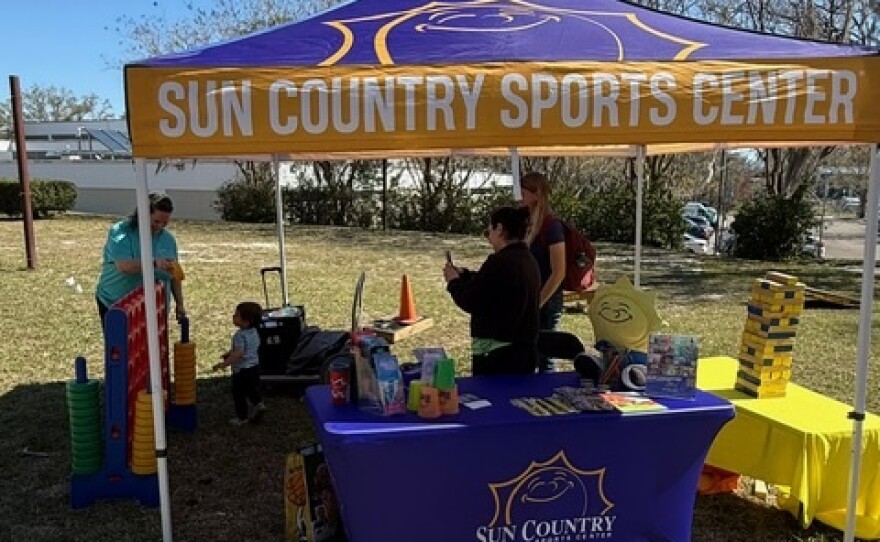 Sun Country Sports Center tent.