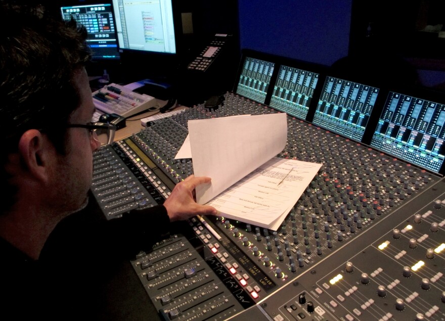 David Betancourt, an automated dialogue replacement mixer, or ADR, looks over a cue sheet in the control room. Looping enhances the experience, Betancourt explains. "If you're watching without all of this stuff that gets filled in, in postproduction, it feels dead — it feels really flat."