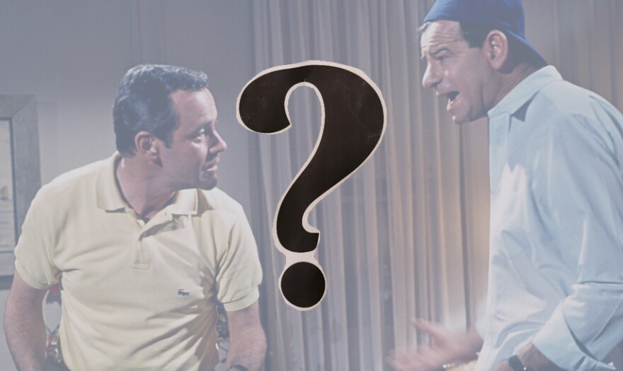 Scene from "The Odd Couple" of Felix and Oscar arguing; a question mark in the foreground