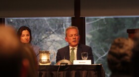 Ben Stevens, Alaska Gov. Mike Dunleavy's chief of staff, speaks at a forum at the Alaska Chamber's fall meeting in Girdwood on Tuesday, October 29, 2019. Also present was Senate President Cathy Giessel, left, and House Speaker Bryce Edgmon. (Photo by Nat Herz / Alaska Public Media)