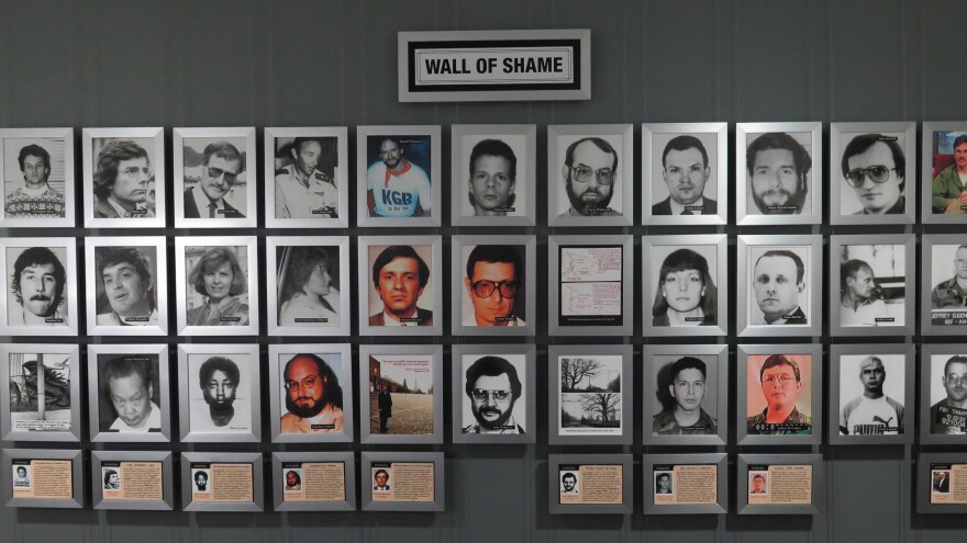 The "Wall of Shame" at the National Counterintelligence and Security Center. It displays photos of double agents and leakers who've been caught.