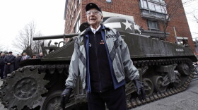World War II tank gunner Clarence Smoyer poses for a portrait near the Charlestown Naval Shipyard in Boston, Feb. 20, 2019. The 95-year-old veteran was surprised with a ride through the streets of Boston in a Sherman tank, one of the tanks most widely used by the U.S. during the war. (Charles Krupa/AP)