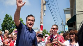 Republican presidential candidate Mitt Romney participates during the Wolfeboro, N.H., Independence Day parade on Wednesday.