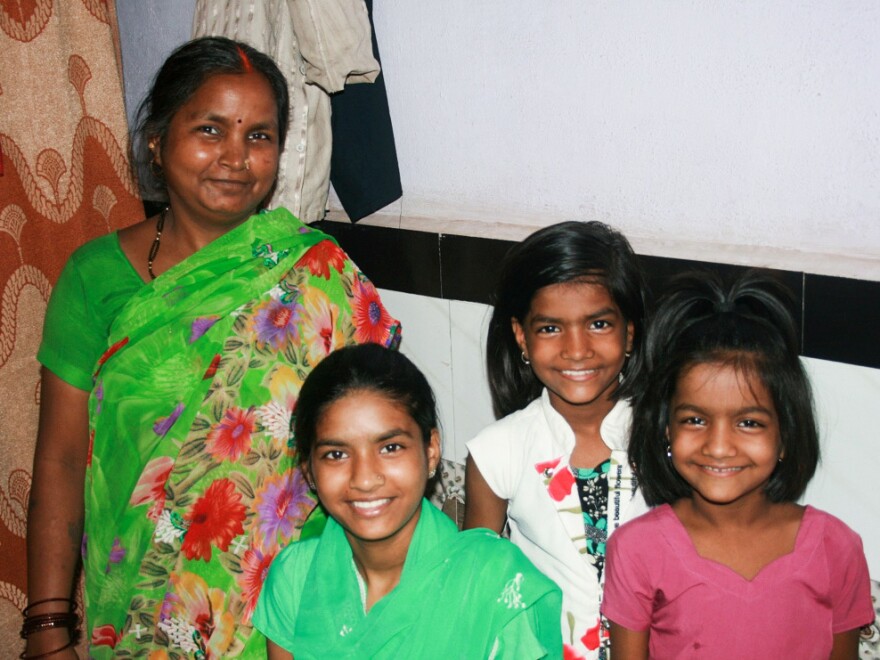 Rima Prajapati with daughters (from left) Jhoti, Aarti and Sangeeta. Jhoti and Aarti were both born deaf. Rima moved her daughters from their village to Mumbai so they could attend a school for the deaf.