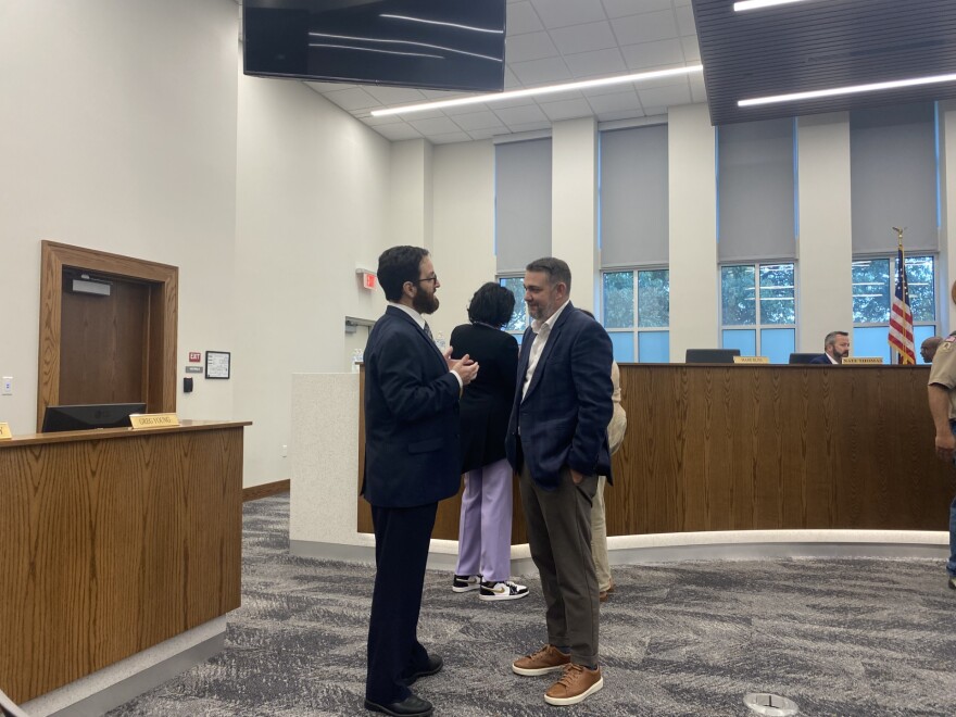  Ryan Essex talks to Cape Girardeau city attorney Greg Young after being named interim Ward 5 councilman Monday, Oct. 7 at City Hall.