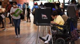 Steady flow of voters cast their ballots at the Stephen P. Clark Government Center in downtown Miami, as Florida began its first day of early voting on Monday, October 19, 2020.