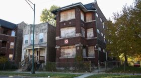 A boarded up apartment building