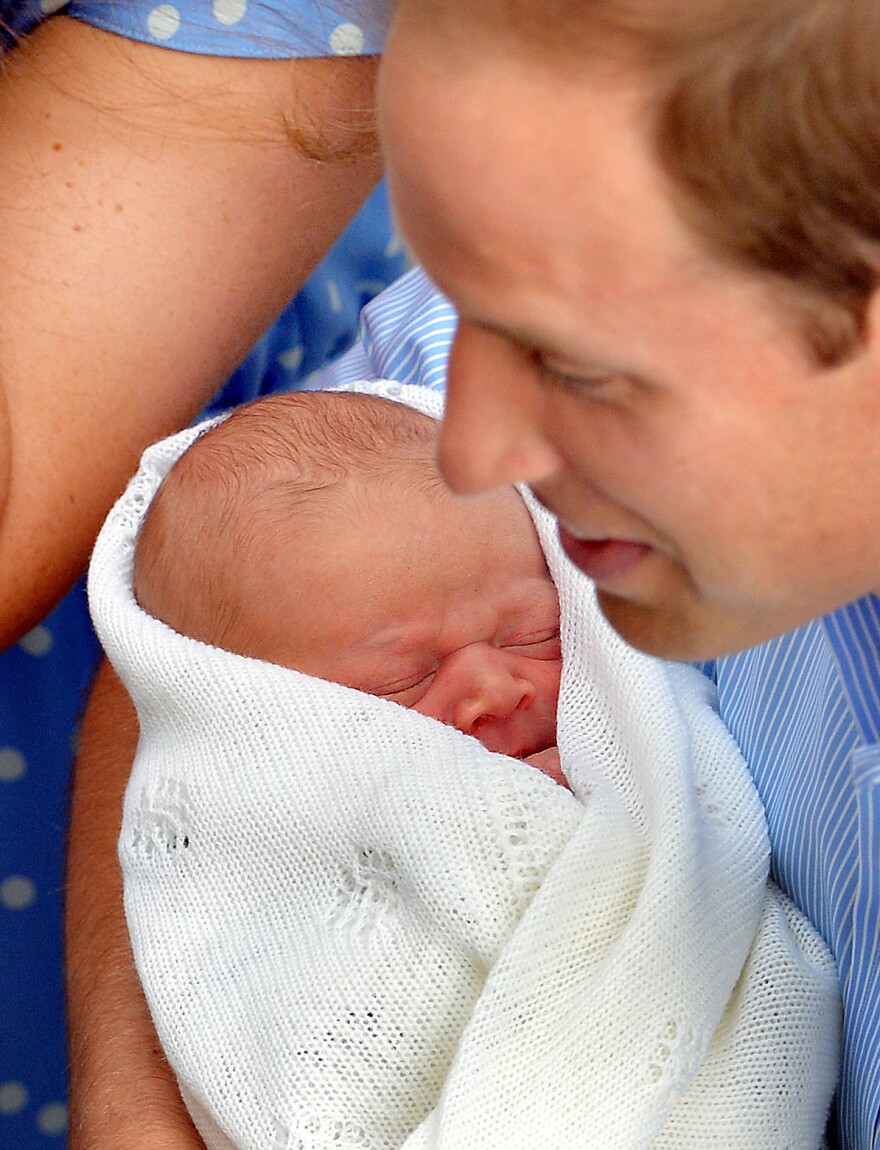 Prince William, Duke of Cambridge and Catherine, Duchess of Cambridge depart The Lindo Wing with their newborn son at St Mary's Hospital on Tuesday in London.
