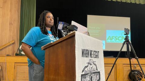 Ingrid Walker-Henry listens to a member of the audience speak at a town hall protesting budget cuts at Milwaukee Public Schools at Washington Park Senior Center on April 21, 2026.