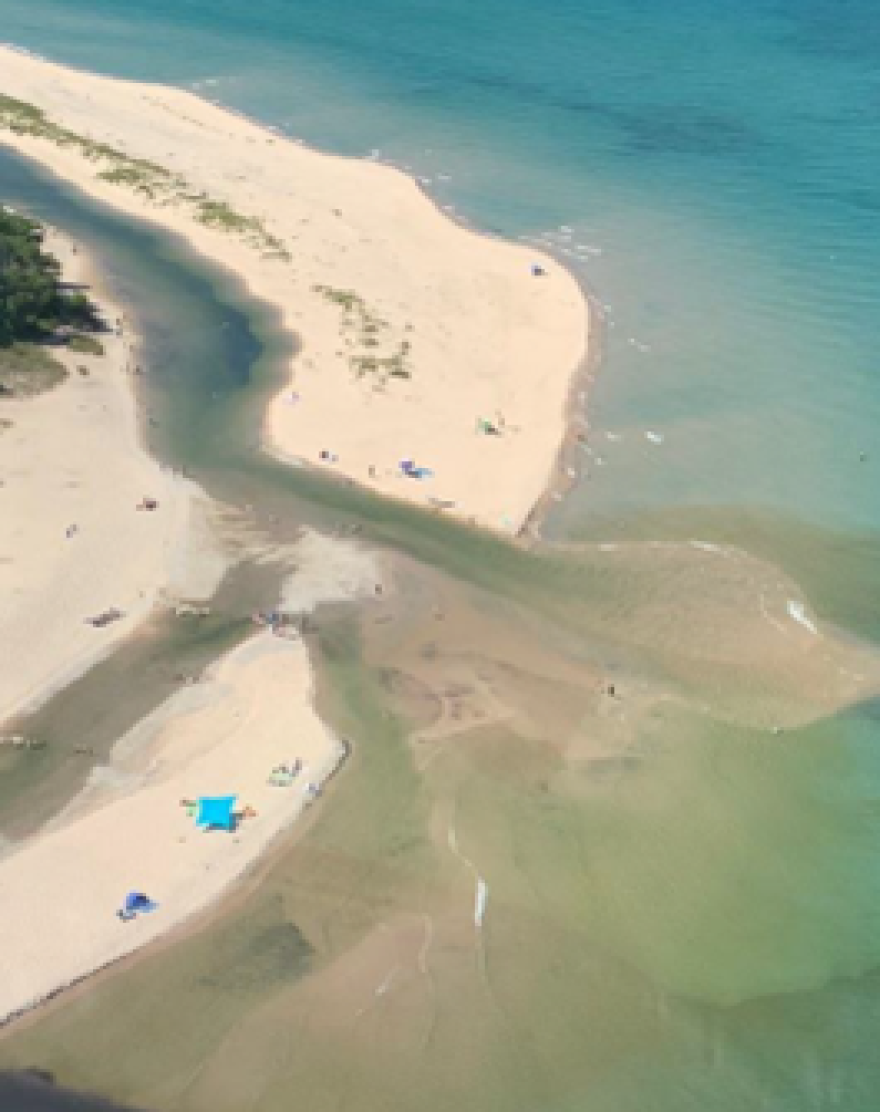 This August 2022 image released by the National Park Service, shows an illegal diversion of the Platte River into Lake Michigan at Sleeping Bear Dunes National Lakeshore, Mich. A man accused of diverting a national park river to ease boat access to Lake Michigan has been convicted of two misdemeanors. Andrew Howard, of Frankfort, was found guilty of tampering and vandalism Wednesday, February 7, 2024, during a brief trial in front of U.S. Magistrate Judge Ray Kent.