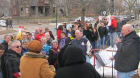 A crowd gathers in a Grand Rapids neighborhood to protest Governor Snyder's budget plan earlier this month.