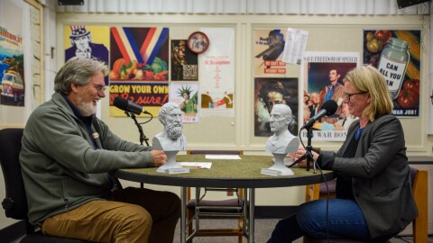 Jeff Crane and Sara Hart sit in a podcast studio. 