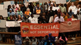 Local officials, clergy, immigration advocates and neighbors call for the release of Fatou Traore at First United Methodist Church in Iowa City on Wednesday.