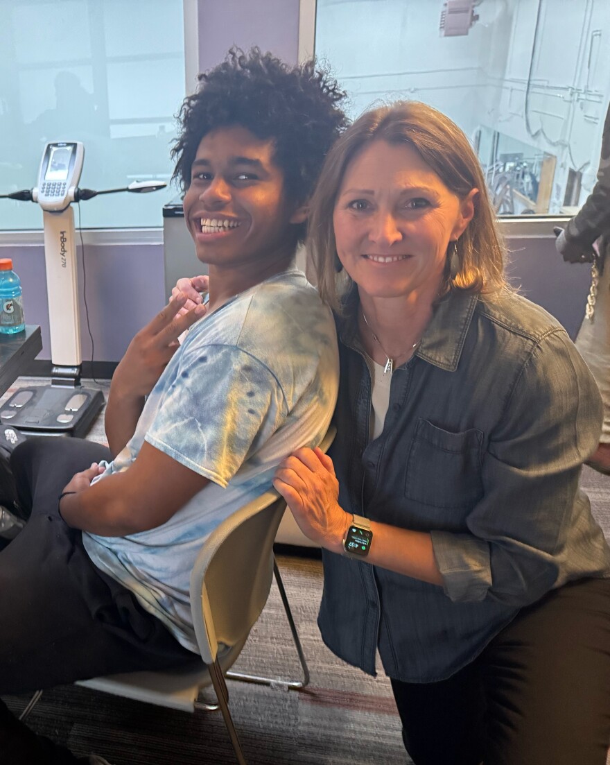 Mentee, Mike (left) celebrates his 17th birthday with mentor, Allison Gorelick (right) and various company.