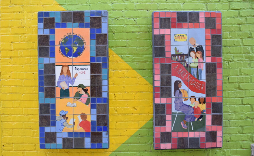 Art was installed at the Mitchell Street Branch alleyway by La Familia de Arte.