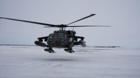 An Alaska Army National Guard Black Hawk helicopter lands in Bethel in April 2021. The National Guard is stationing a Black Hawk in Bethel for the duration of the 2021 Kuskokwim River breakup season.