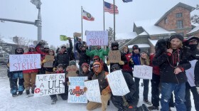 Park City ski patrollers picket outside Cole Sport in Park City after walking off the job Dec. 27, 2024, amid contract renegotiations with Vail Resorts.