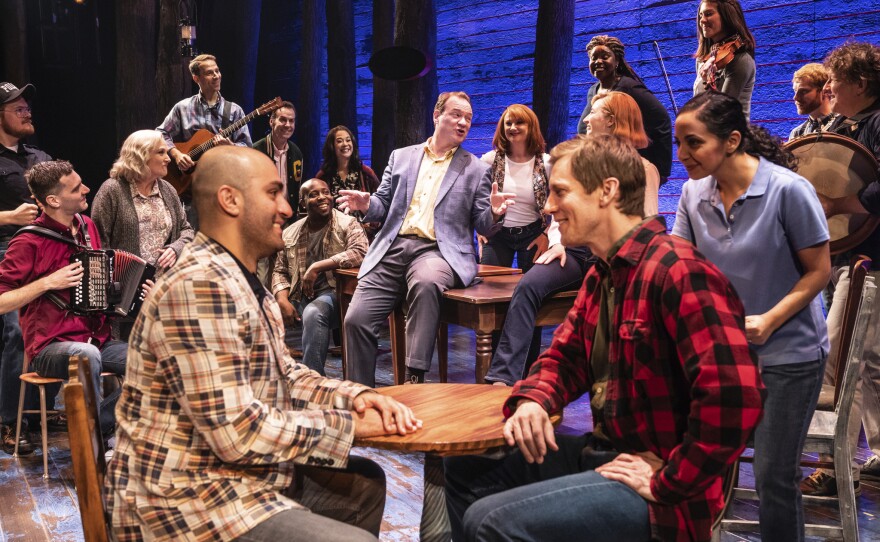 Kevin Carolan, center, portrays Gander mayor George Elliott in the Broadway musical 'Come From Away.' 'Come From Away' plays April 25-30, 2023, at the Hult Center for the Performing Arts in Eugene.