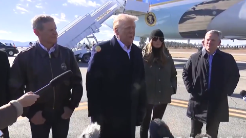 President Donald Trump arriving in Asheville, N.C., on Jan. 24, 2025, joined by First Lady Melania Trump and N.C. Gov. Josh Stein (D).