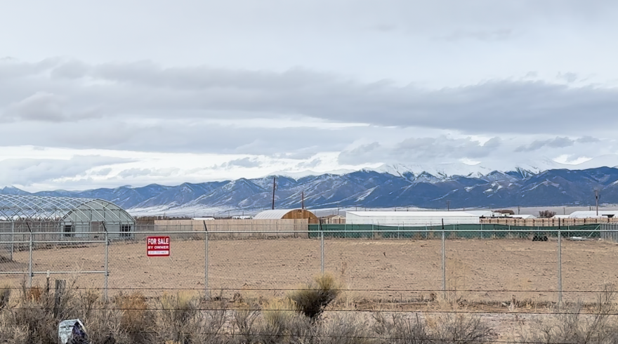 Some fences bear “For Sale” signs as growers face challenging conditions and a tightening market.