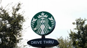 A Starbucks sign is seen on, Jan. 16, 2025, in Houston.
