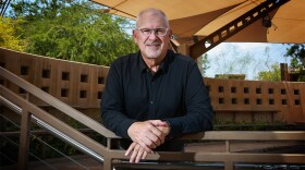 Jeff Roberts leans on a railing at the Springs Preserve.