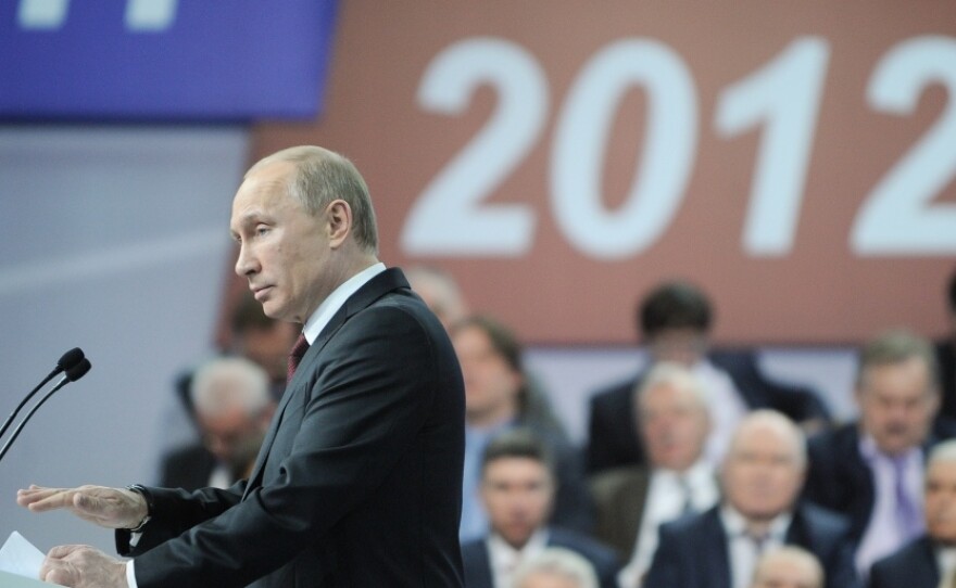 Presidential candidate and Russian Prime Minister Vladimir Putin speaks Wednesday at a meeting with his campaign activists in Moscow.
