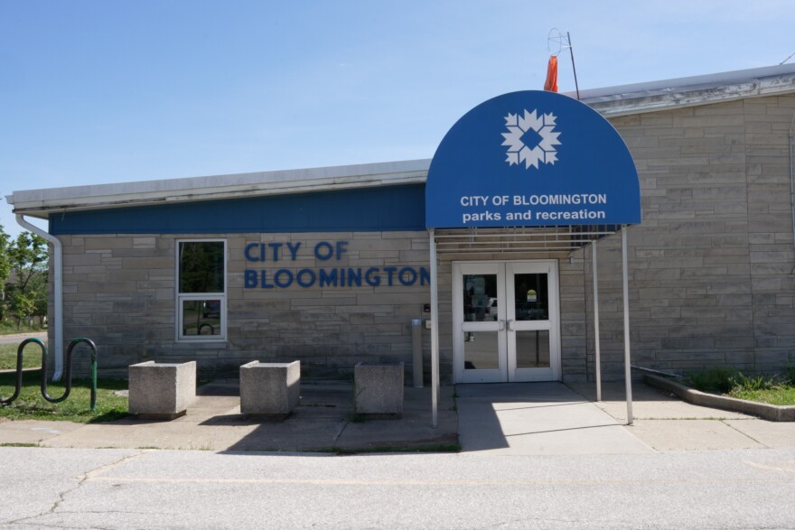 The exterior of the Frank Southern Ice Arena. It has a blue awning that says "City of Bloomington parks and recreation" 