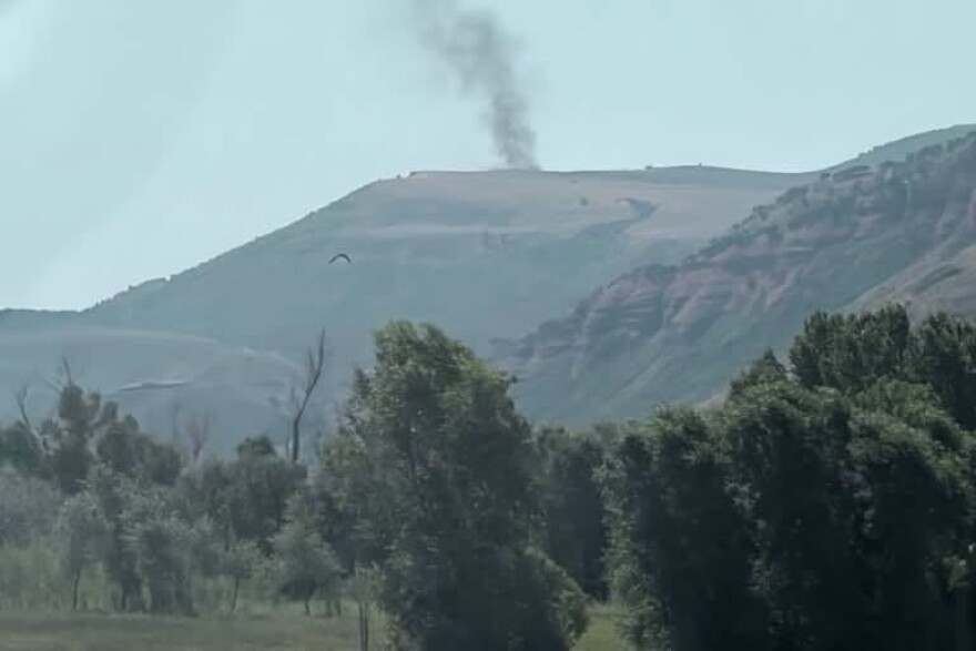 The West Echo Fire burns in the hills west of Echo Reservoir and Interstate 80 in northern Summit County the afternoon of Aug. 7, 2026.