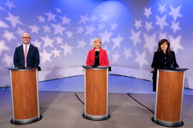 Candidates for Idaho Office of Secretary of State debating on stage at Idaho Public Television.