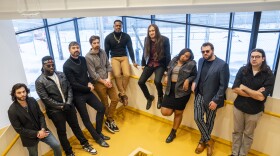 Nine-piece band Apostle Jones poses in a stairwell